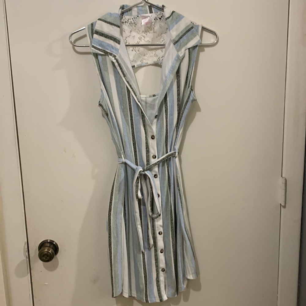 cute mid dress. green,blue,white and black stripes.Lace cut out back.